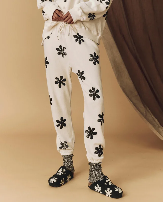 The Hand Stamped Stadium Sweatpant. -- Washed White with Black Daisy